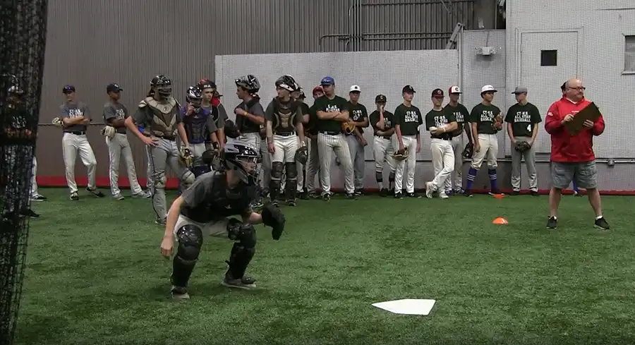 Baseball coaching session with youth team